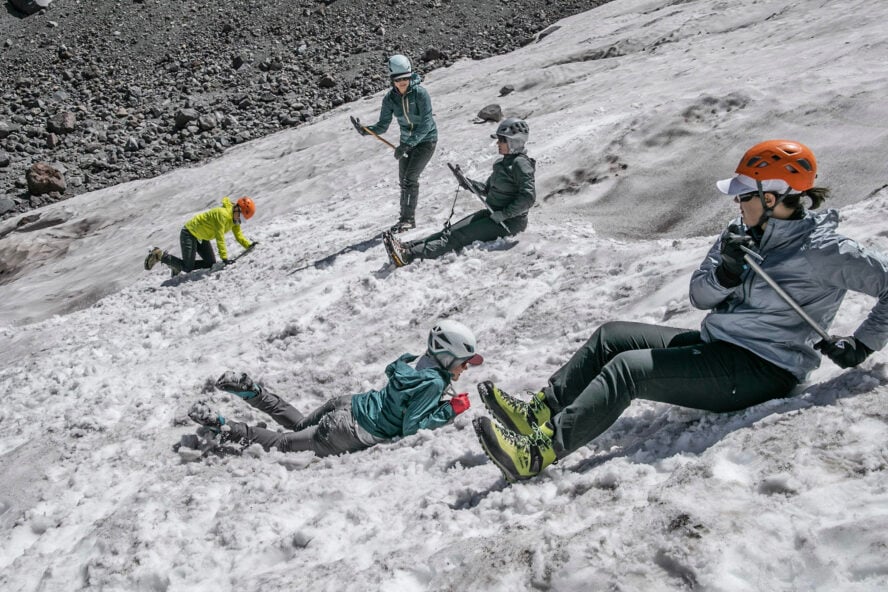 A group of climbers practice self-arrest on Mount Shasta.