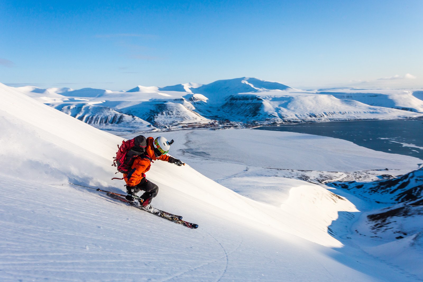 Skier going downhill in Svalbard