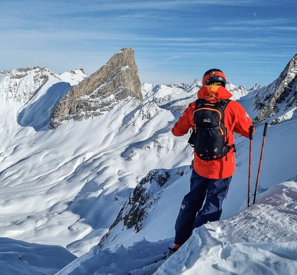 A skier posing on a slope near St. Anton, Austria